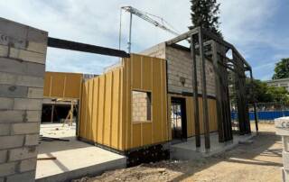 Bâtiment en ossature bois isolation paille