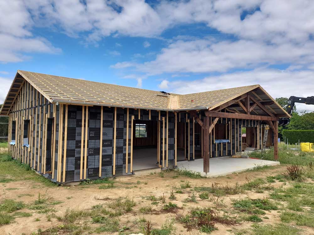 Maison Bois murs ossature bois charpente