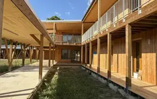 Uzurat bâtiment en murs ossature bois